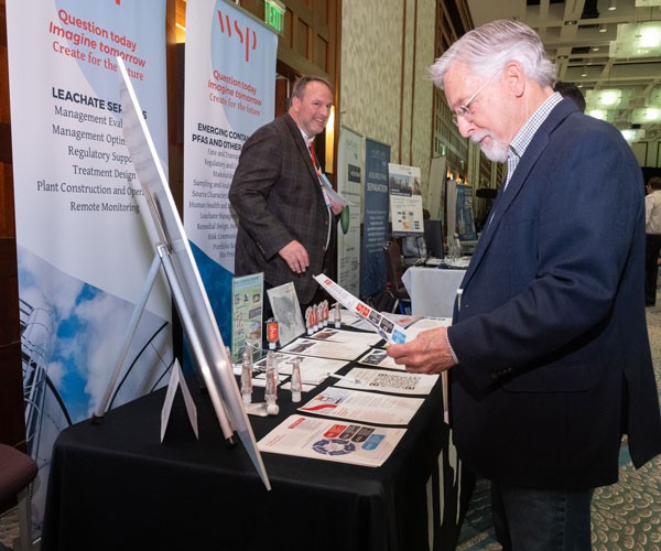 GWMS Attendee reviewing sponsor materials